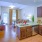 a kitchen with wooden cabinets