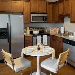 kitchen with dining table with seating
