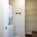 stacked washer/dryer units in laundry area