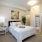 carpeted bedroom with closet
