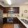 brightly lit c-shaped kitchen