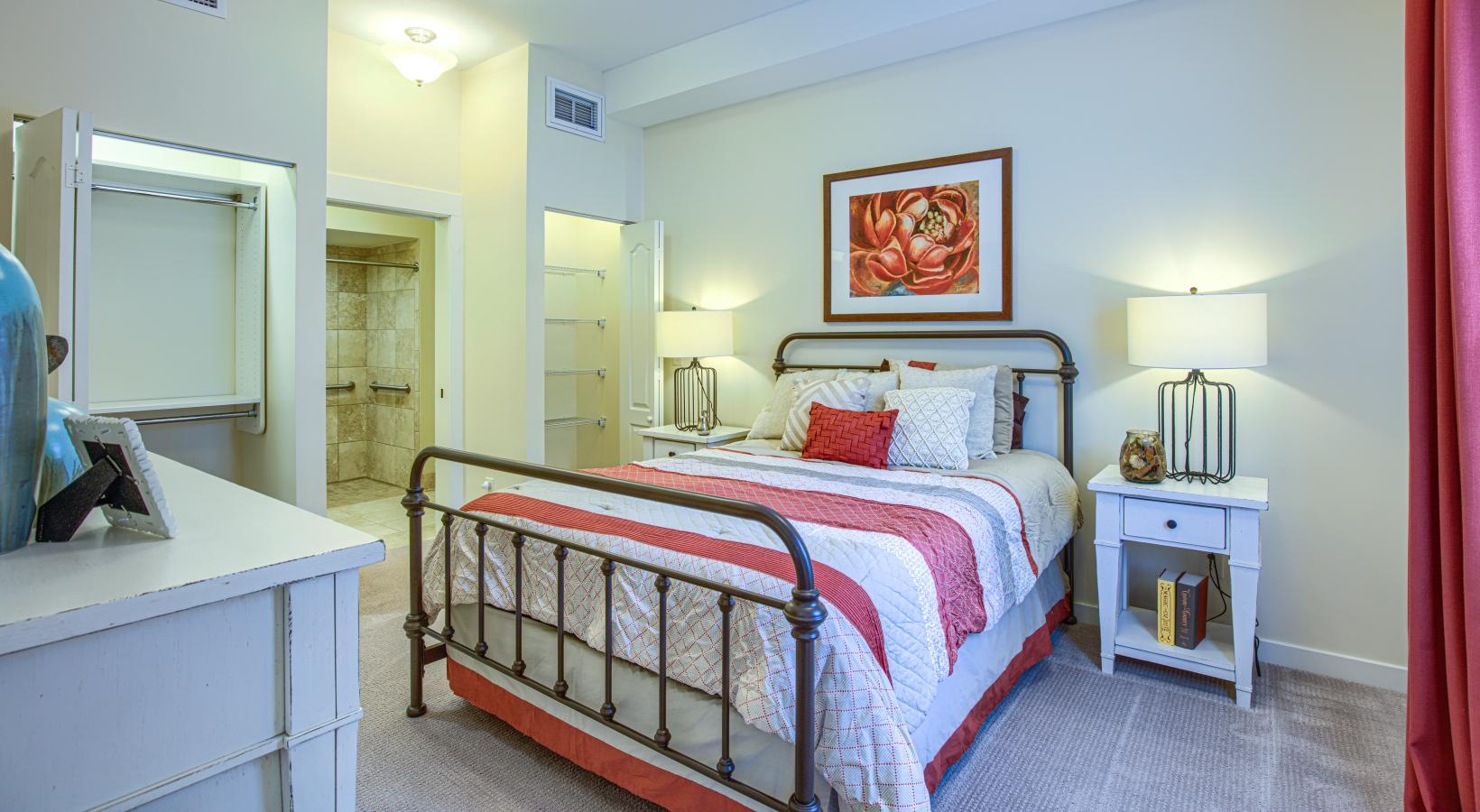 Beautiful bedrooms to fit every need a bedroom with a bed and a dresser